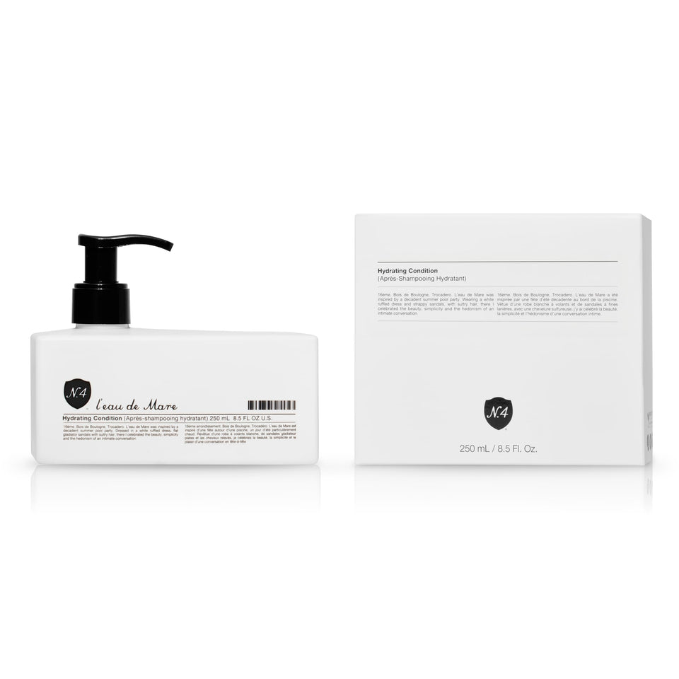 Number 4 Hydrating Conditioner bottle pour for daily moisture and frizz reduction.