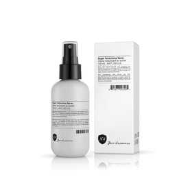 Number 4 Sugar Texture Spray bottle showing beachy waves and flexible hold.