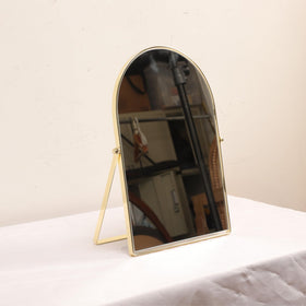 Numjeg brushed back fabric housing adds premium detail to mirror