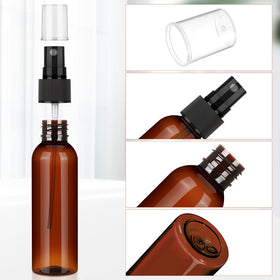 Nuogo travel 4oz amber spray bottle ready for serums, toners, and oils.