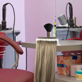 Nuogo wig and extensions organizer for stacking and color separation during styling.