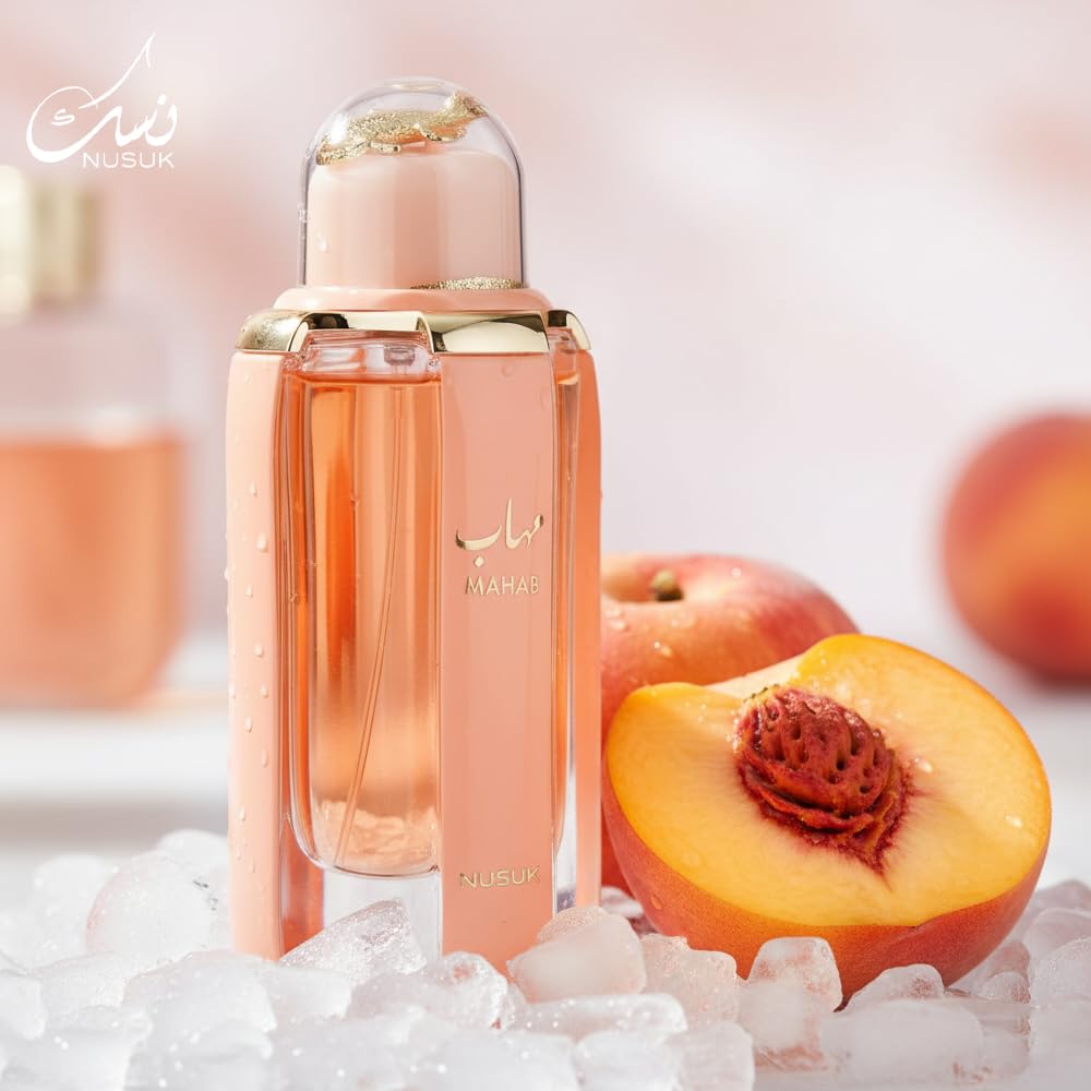Nusuk Mahab fragrance notes card highlights red fruits and musk hints.