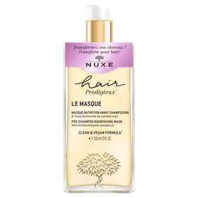 Nuxe Hair Prodigieux pre-shampoo mask applied to dry hair for deep nourishment