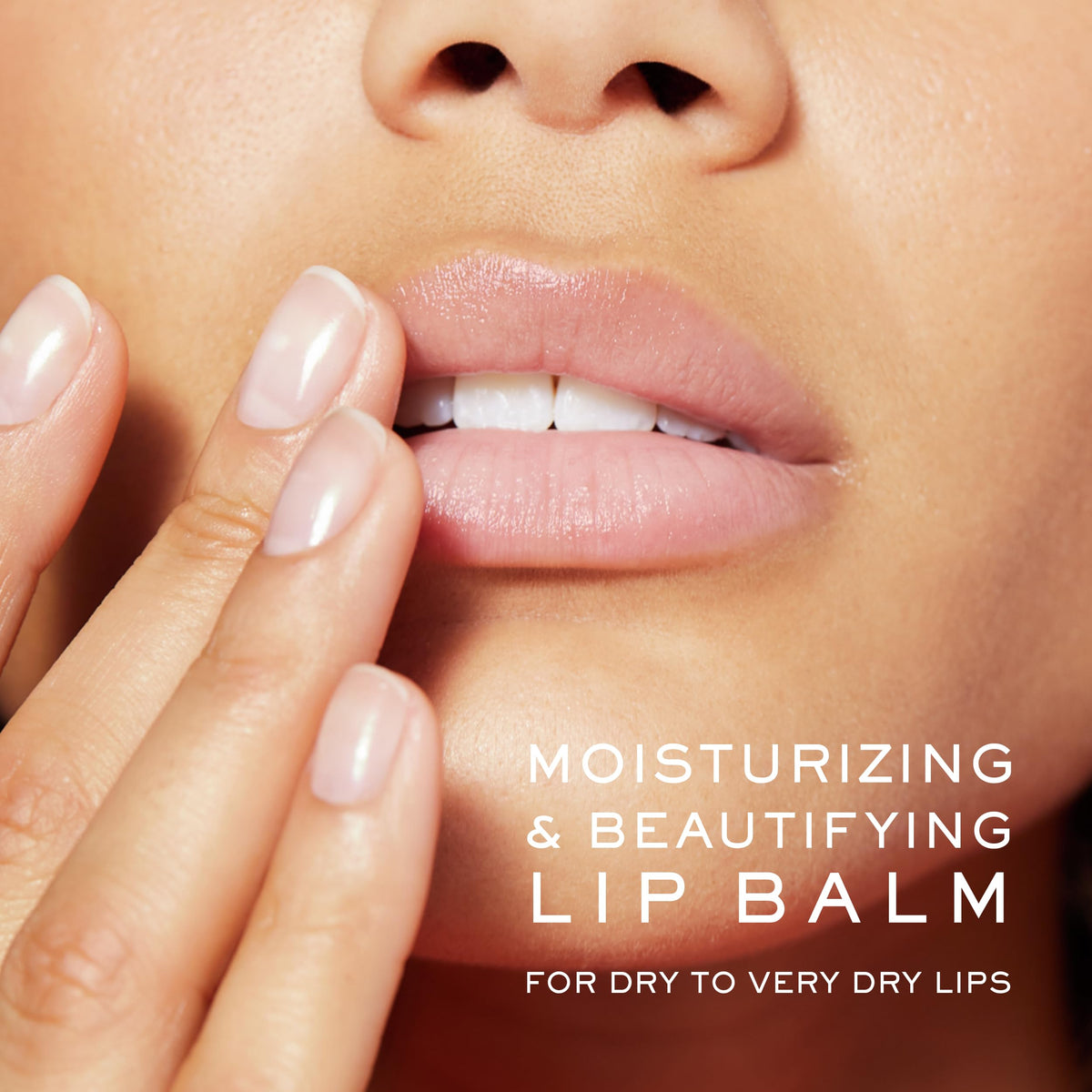 Close-up of applying Nuxe lip balm with rose oil for smooth lips.