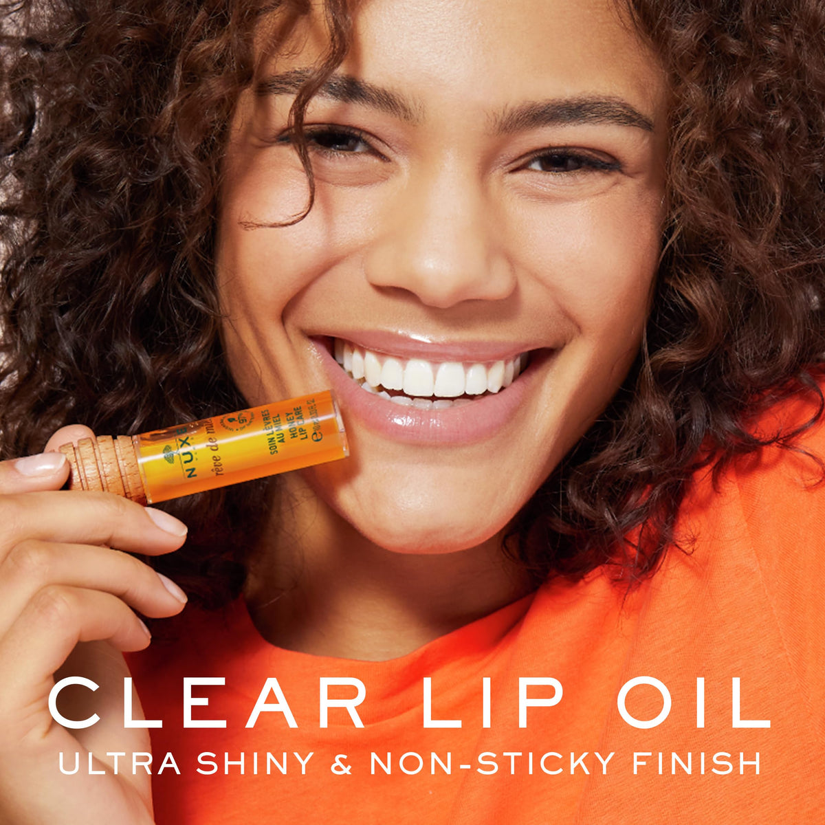 Nuxe Reve de Miel applicator for precise honey-spoon application.