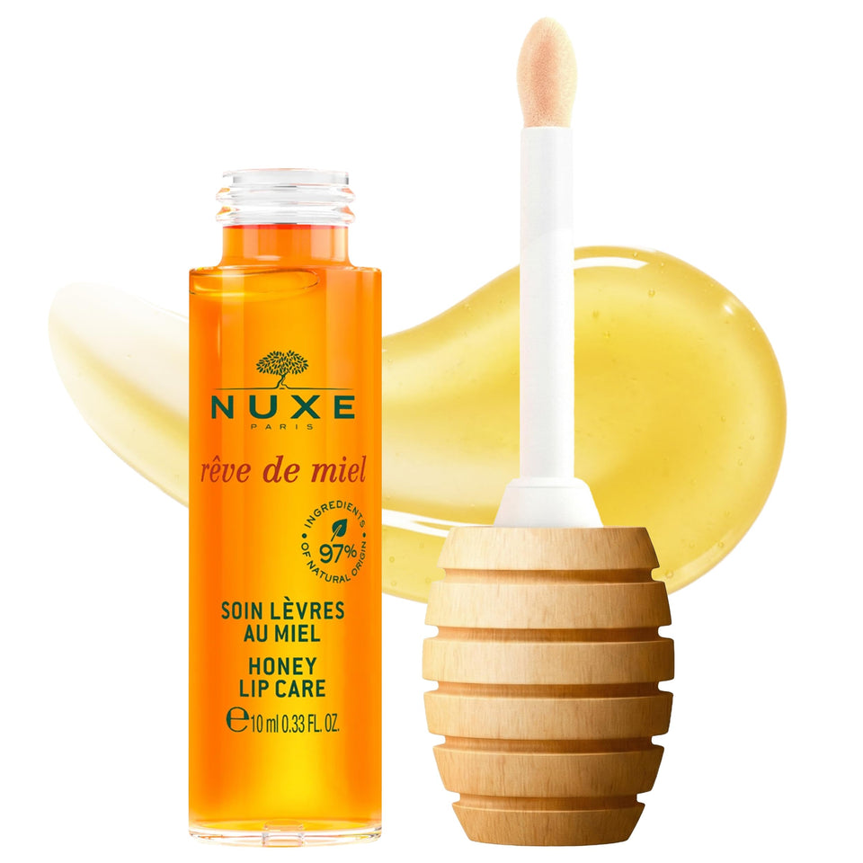 Nuxe Reve de Miel lip gloss bottle for radiant shine.