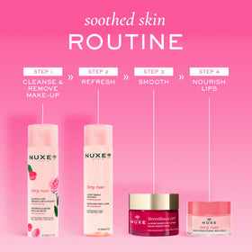 Rose petals beside the Nuxe Very Rose bottle highlighting calming cleanse.
