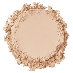 NYX Stay Matte powder foundation with brush for quick, buildable coverage.