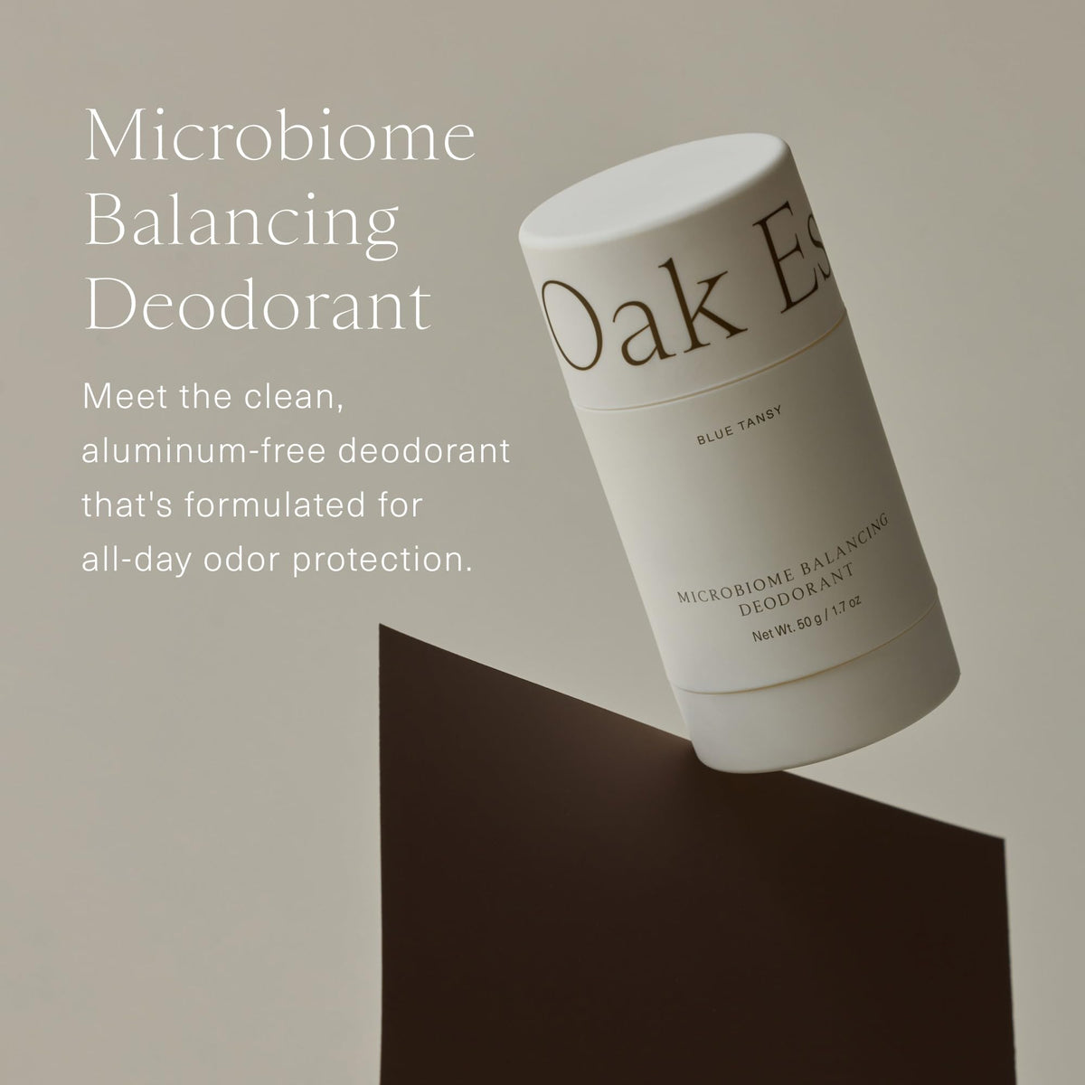 Oak Essentials deodorant application close-up showing clear dry-down and herbal scent.