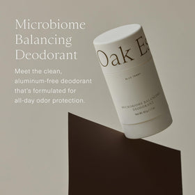 Oak Essentials deodorant application close-up showing clear dry-down and herbal scent.