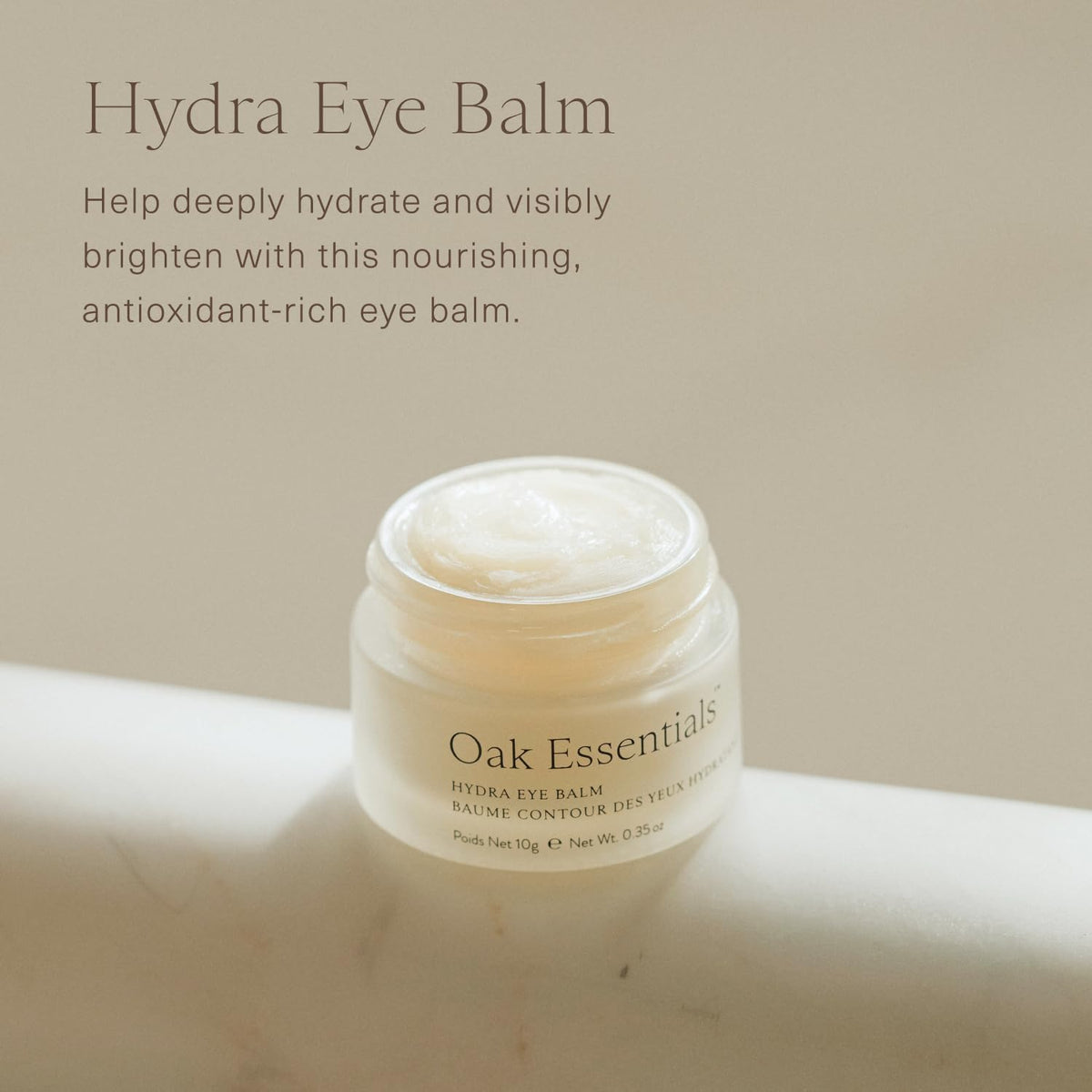 Oak Essentials Hydra Eye Balm being gently dot-applied under-eye.