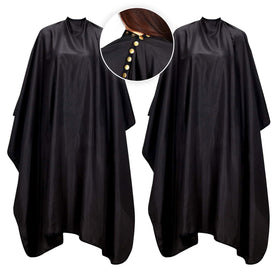 Oak Leaf hair cutting cape laid flat showing full 57x67 inch coverage for mess-free styling.