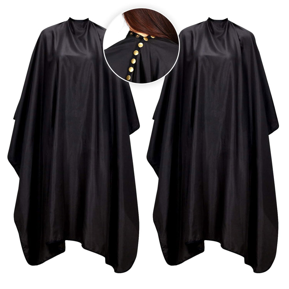 Oak Leaf hair cutting cape laid flat showing full 57x67 inch coverage for mess-free styling.