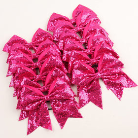 OAOLEER 12-pack bows on display in pink, budget-friendly option for teams and gifts