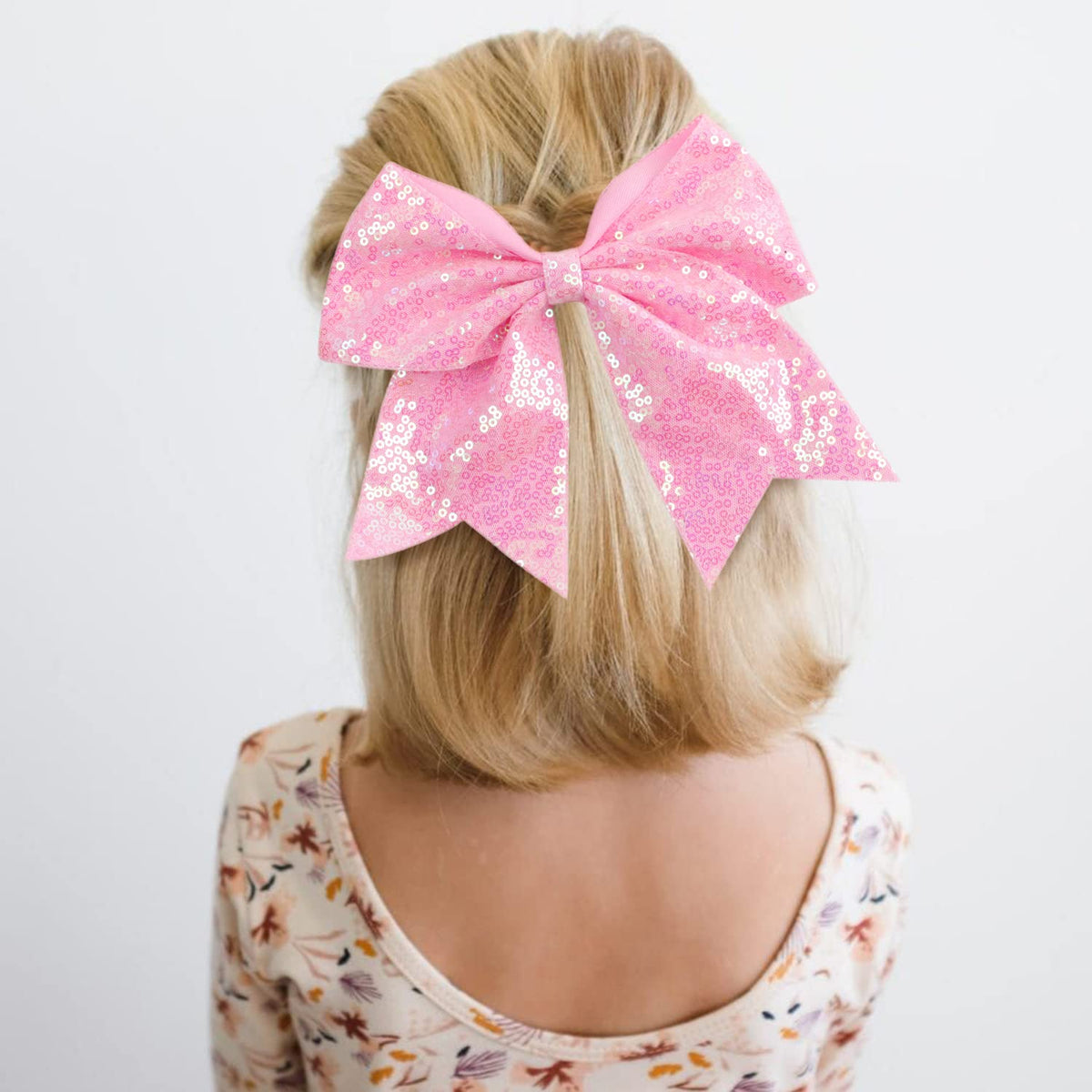 Close-up of OAOLEER sequin-mixed color bows highlighting sparkle for practice.
