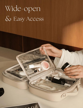 Oaque clear cosmetic bag side pocket detail shows extra storage for travel essentials.