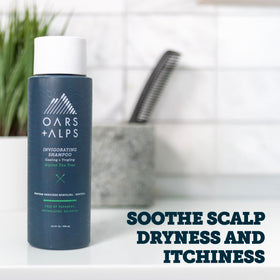 Oars + Alps bottle top highlighting alpine scent and cooling feel.