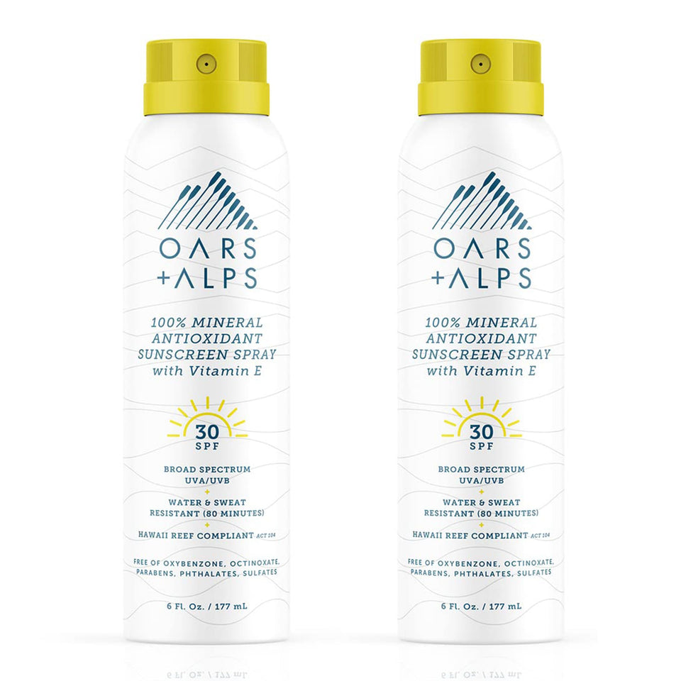 Oars + Alps mineral sunscreen spray bottle ready for quick sun protection on the go.