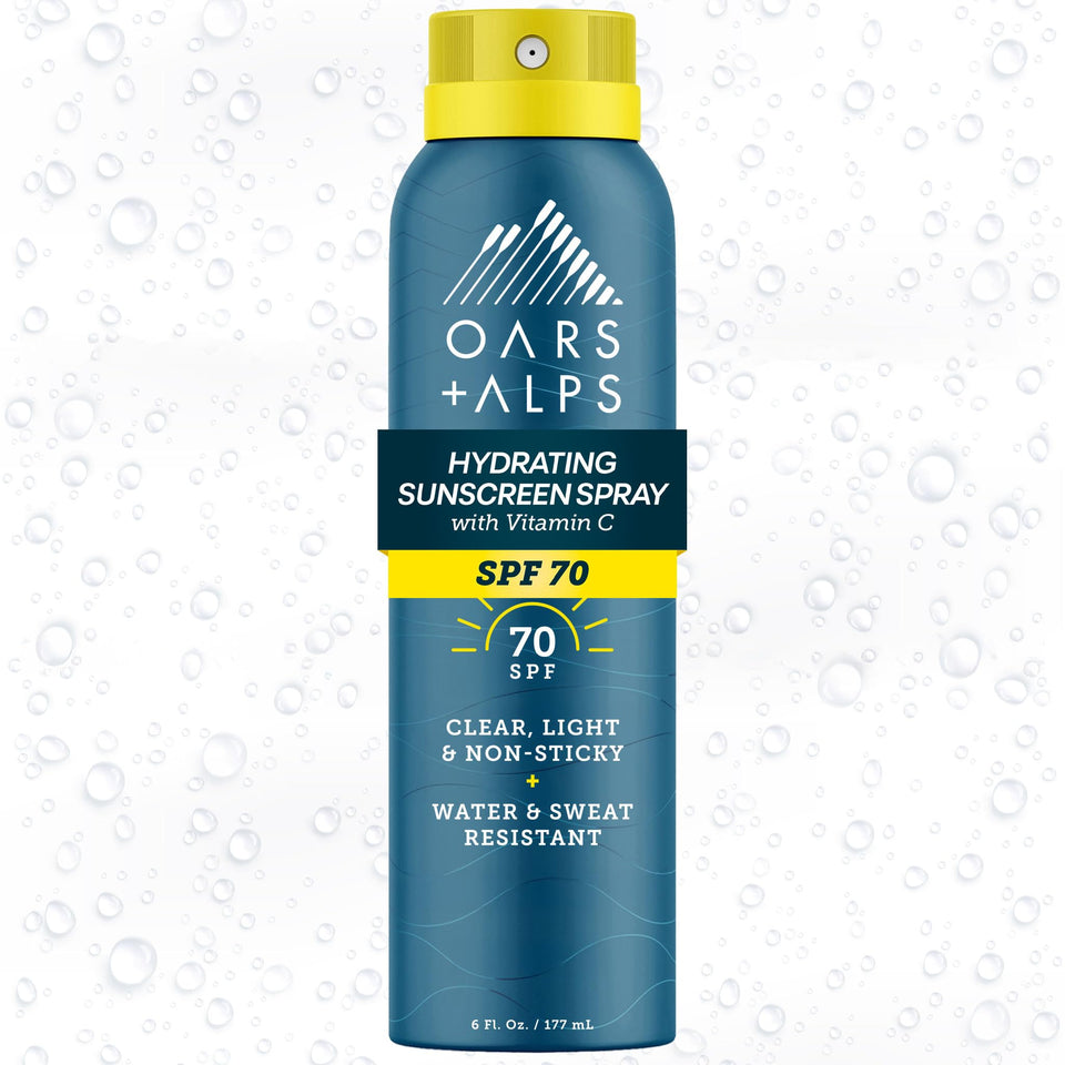 Oars + Alps SPF 70 spray bottle delivering fast-absorbing sun protection for face and body.