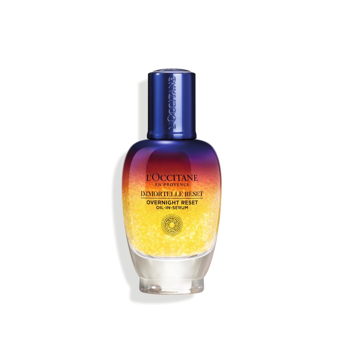 L'Occitane Immortelle Overnight Reset Oil-in-Serum bottle with antioxidant-rich formula for radiant mornings