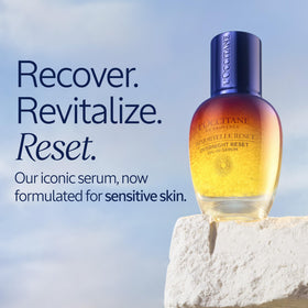 Drop of L'Occitane Immortelle serum on skin showing quick absorption