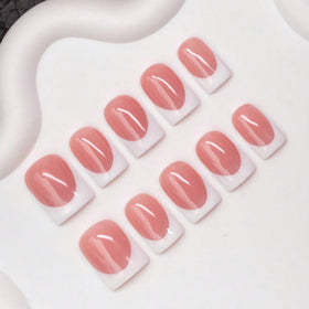 OCOUYVD handmade press-on nails in solid color with a white French tip for elegance.