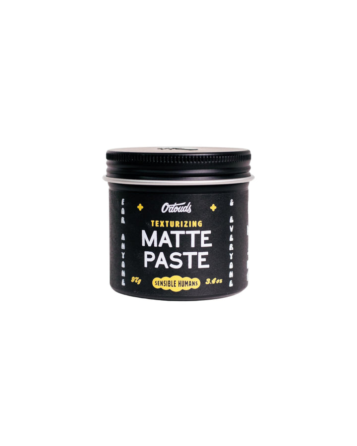 O'Douds Matte Paste bottle close-up showing strong hold and matte finish.