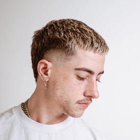 O'Douds Standard Pomade finished slick look highlights high shine and easy washout.