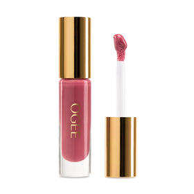 Ogee Beyond Clean Lip Gloss Wild Rose tube shows rich rosy color and hydration
