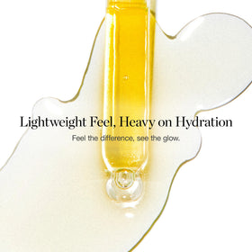 Ogee jojoba glow bottle resting on a bathroom shelf ready for daily routine.