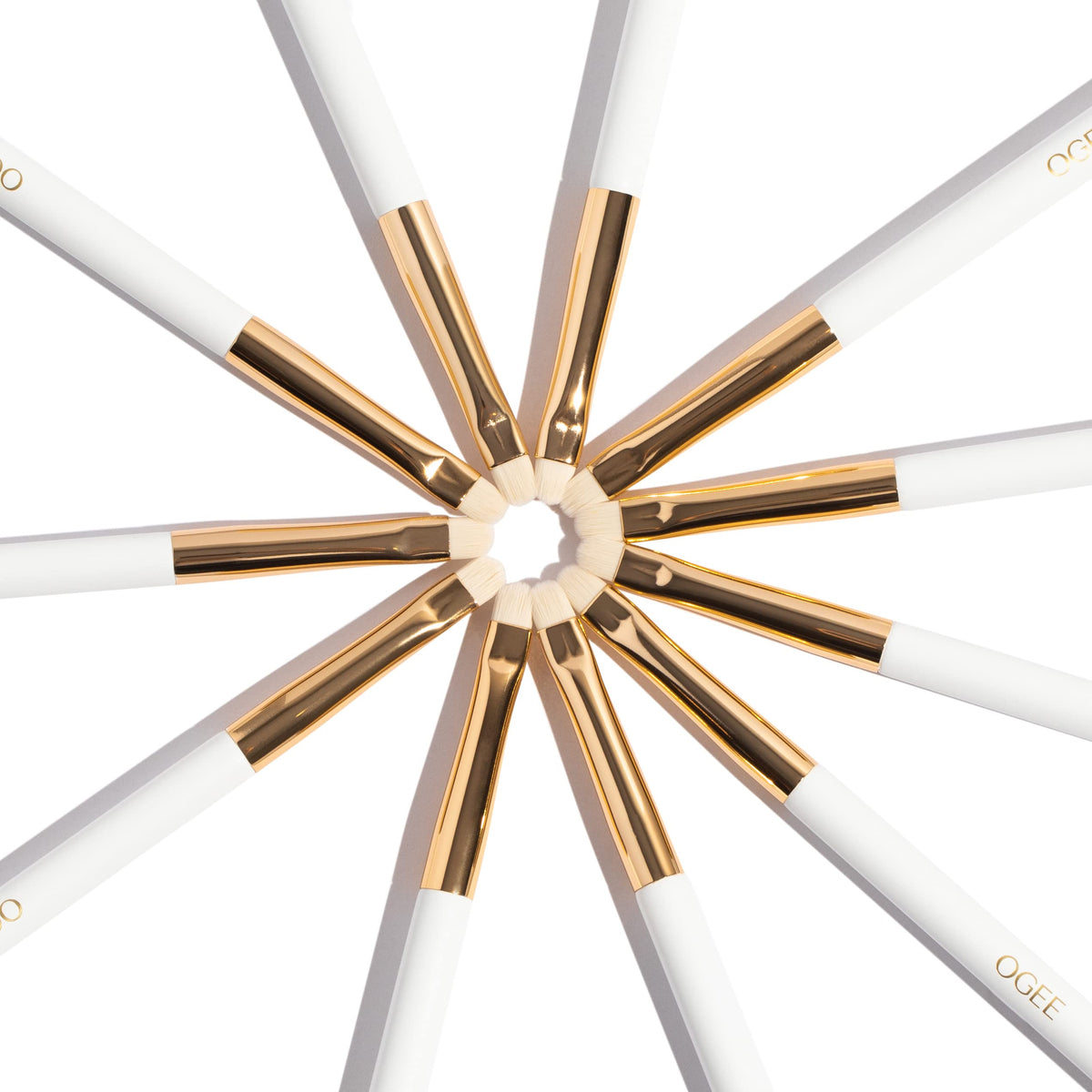 Ogee Precision Brush paired with Sculpted Face Sticks for a seamless routine.