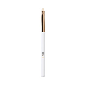 Ogee Precision Brush with tapered vegan bristles for flawless concealer application.