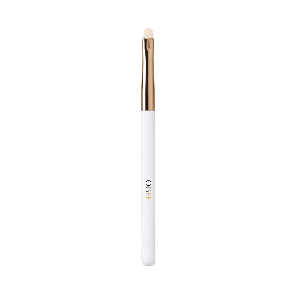 Ogee Precision Brush with tapered vegan bristles for flawless concealer application.