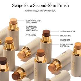 Ogee Sculpted Complexion Foundation Stick travel display highlights portable makeup use.