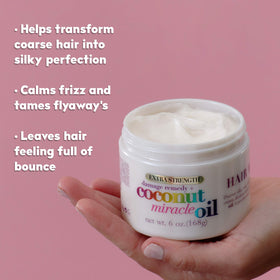 Applying OGX mask to damp hair to help tame frizz and flyaways