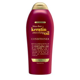 OGX Frizz-Free + Keratin Smoothing Oil Conditioner bottle ready for daily frizz control