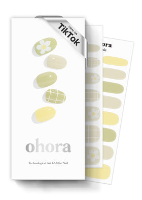 Ohora Olivia green patterned nail wraps applied for a chic weekend look with durable wear.