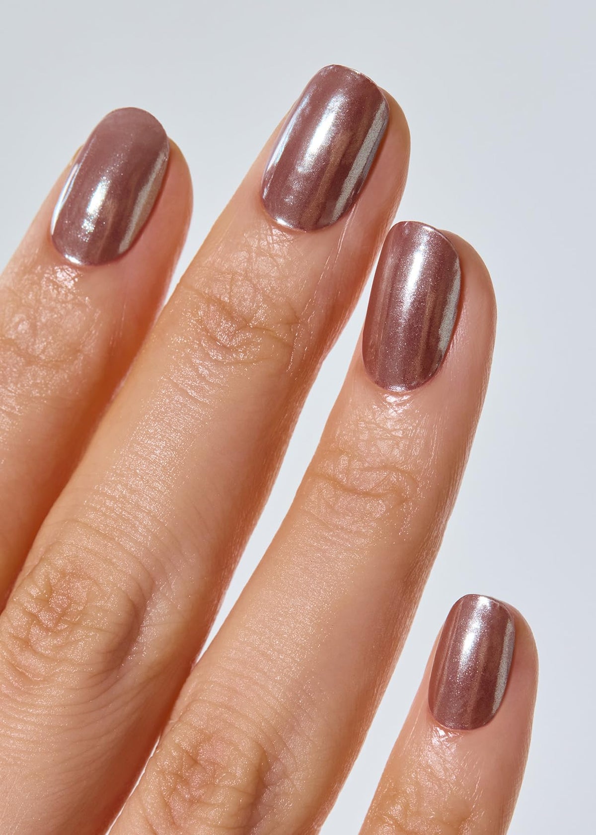 ohora semi cured gel nail strips n chocolate chrome application scene for quick salon-like results