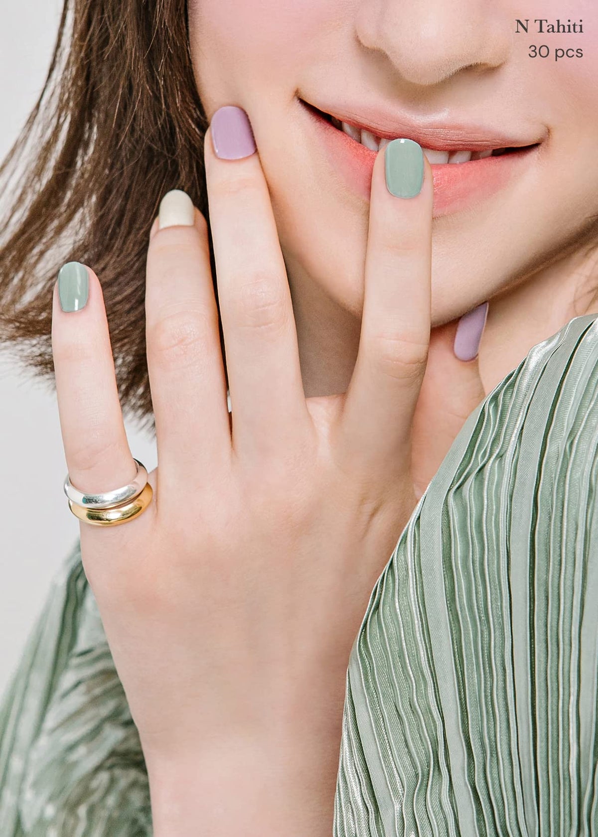 ohora N Tahiti strips on nails showing glossy finish and fit.