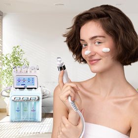 OIJIIE facial machine in use demonstrates at-home spa care.