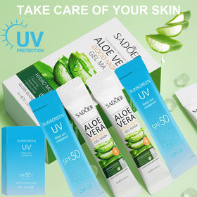 Okerker travel-friendly sunscreen and aloe gel duo in a beach bag.