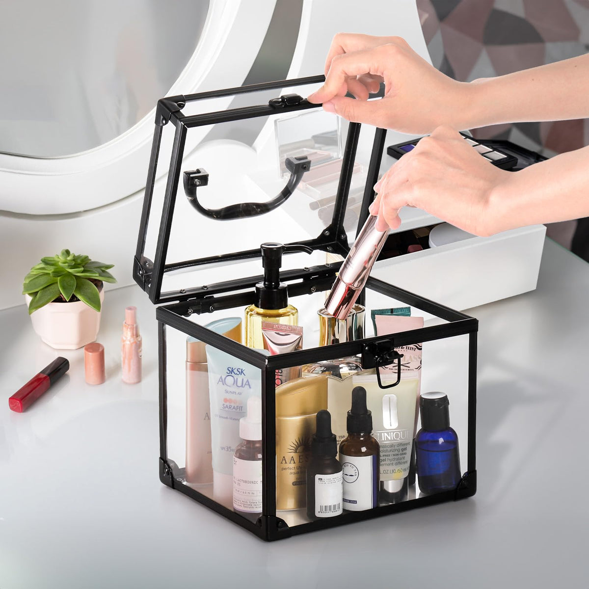 Okllen Crown Box travel-use image demonstrates compact organizer for cosmetics on trips.