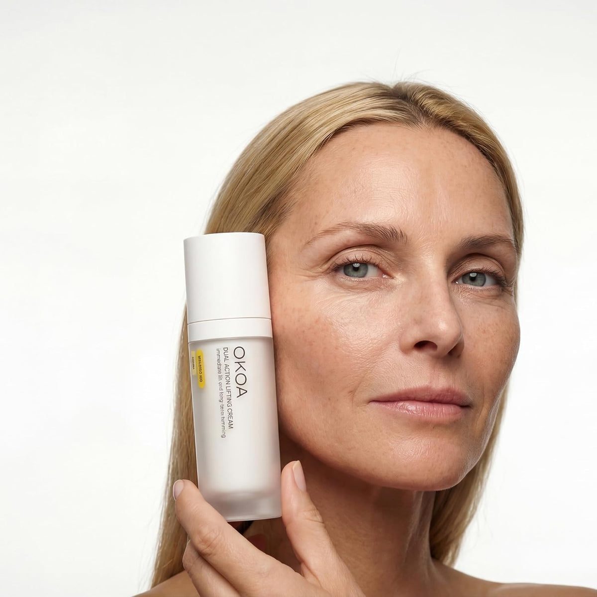 OKOA Skin Dual Action Lifting Cream application scene for a smooth daily routine