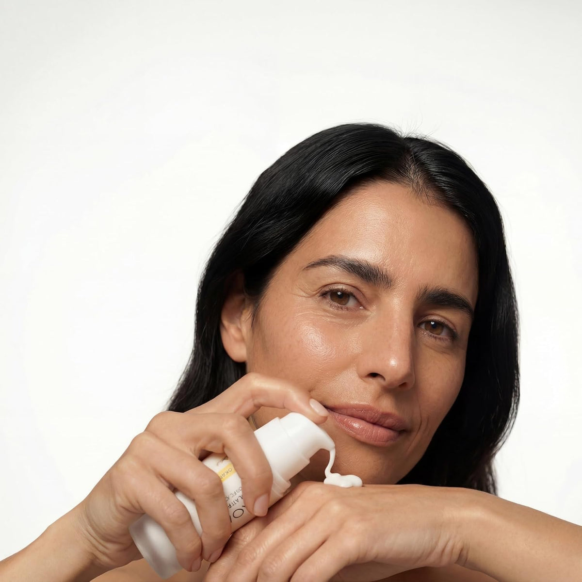 OKOA Skin Dual Action Lifting Cream jar close-up shows rich texture and hydration potential