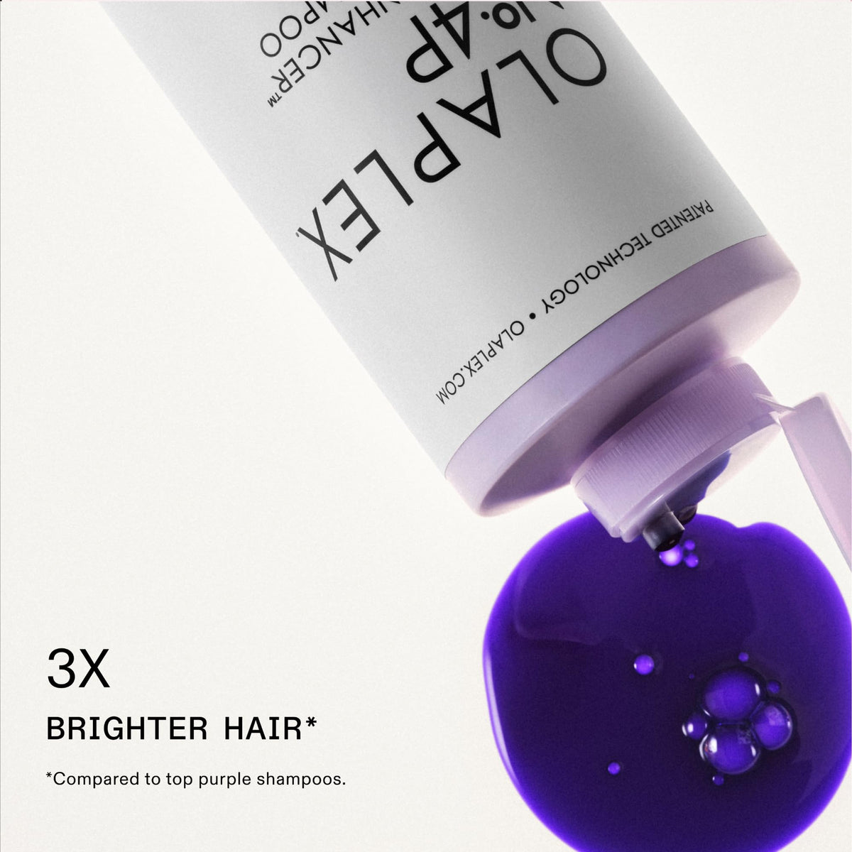 Olaplex Nº.4P purple-toning shampoo lather visible for cleansing and tone.