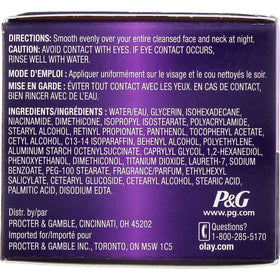 Olay Age Defying Night Cream close-up showing silky texture ready for nightly use.