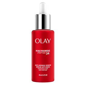 Olay Niacinamide + Peptide 24 serum bottle close-up, fragrance-free hydration.