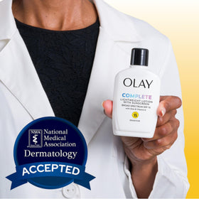 Olay non-greasy cream closeup demonstrates fast absorption and fragrance-free formula.