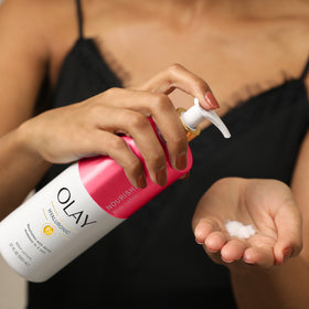 Olay Nourishing & Hydrating lotion on counter highlights convenient daily use.