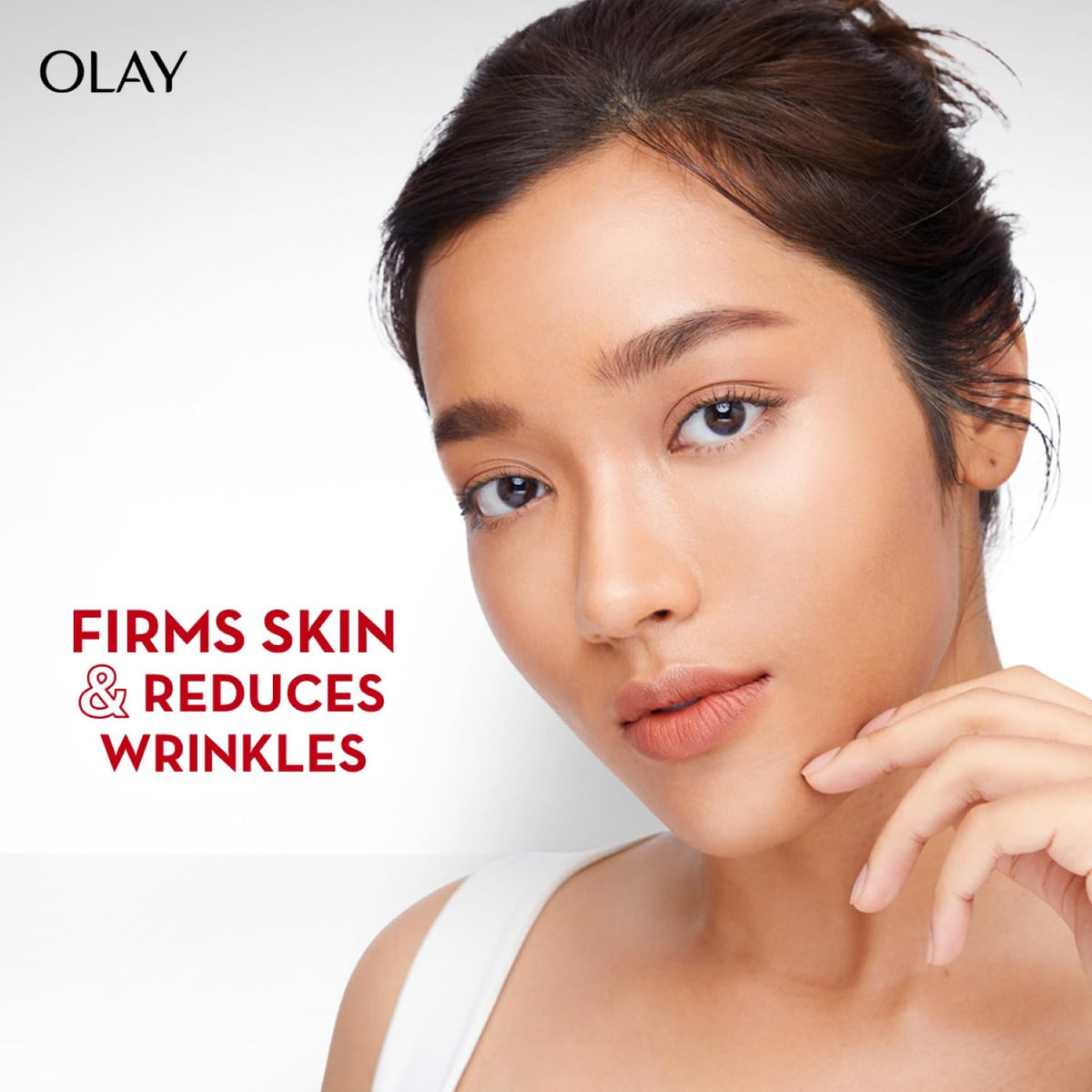 Olay Regenerist serum texture close-up shows a light, non-greasy feel.
